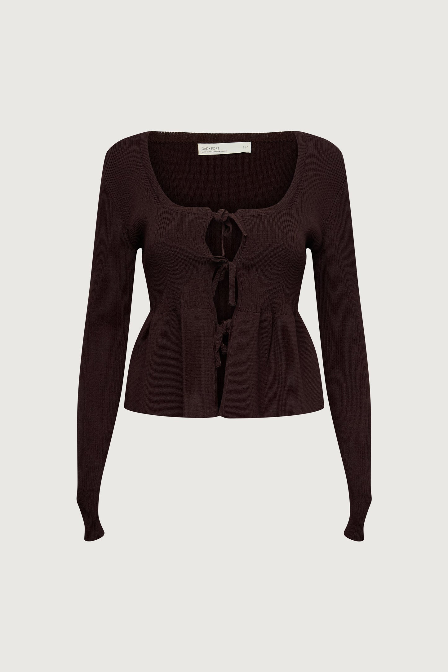RIBBED TIE FRONT PEPLUM SWEATER