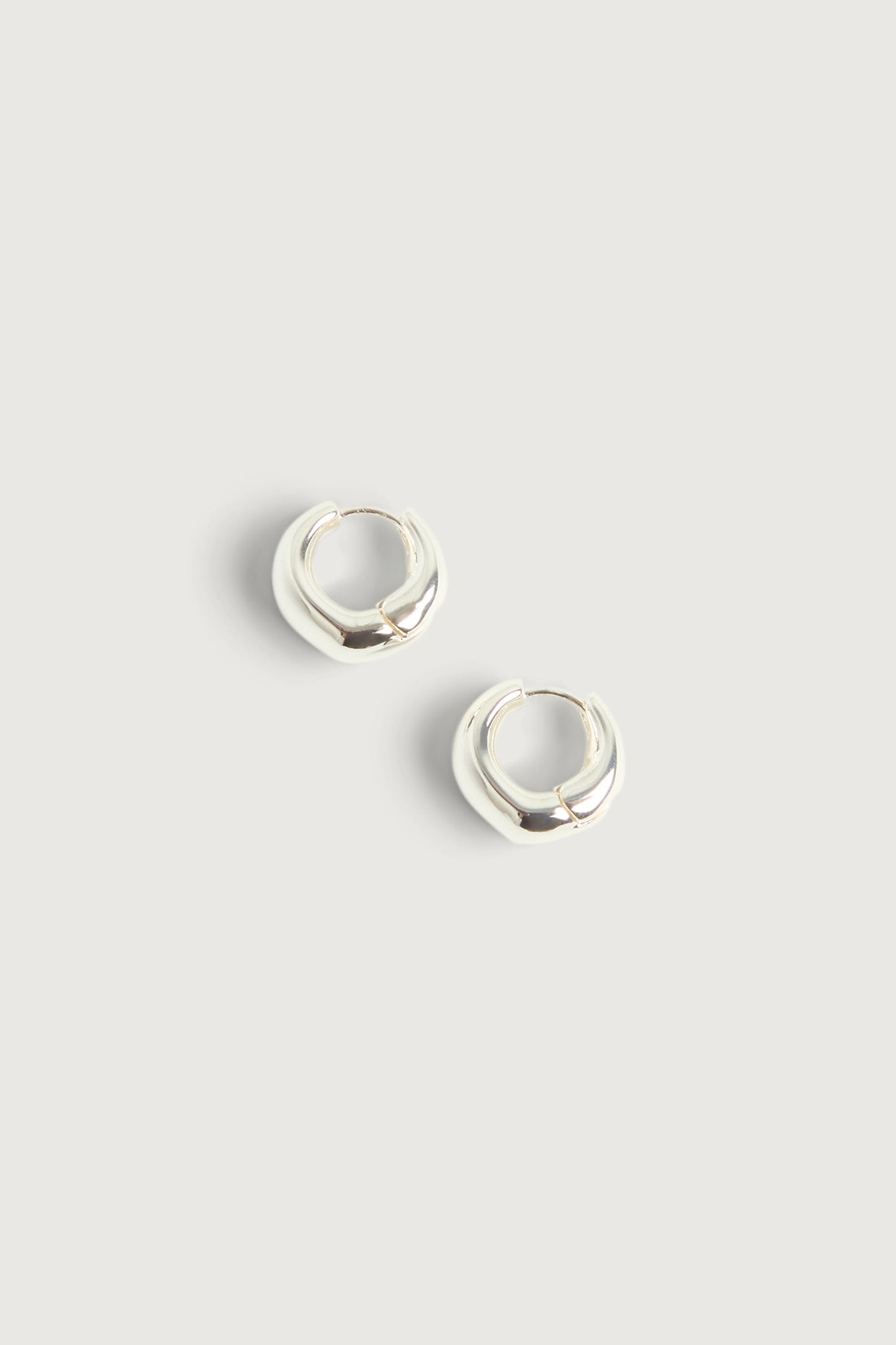 CRESCENT HUGGIE HOOP EARRINGS