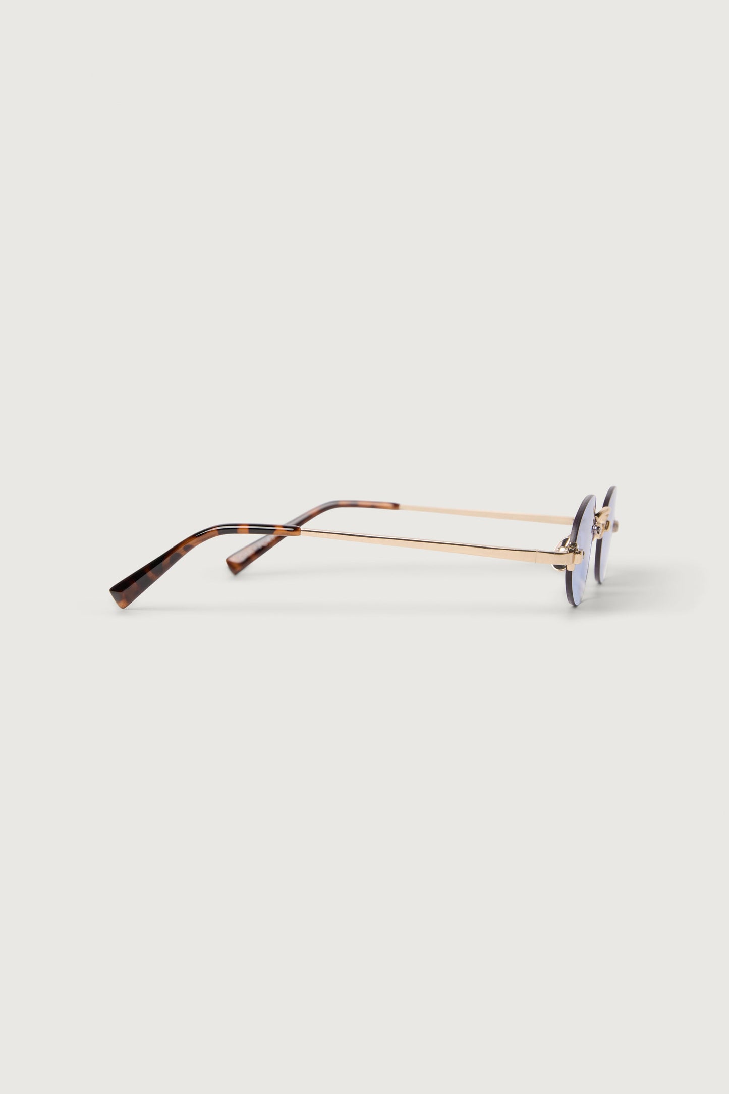 OVAL FRAMELESS SUNGLASSES