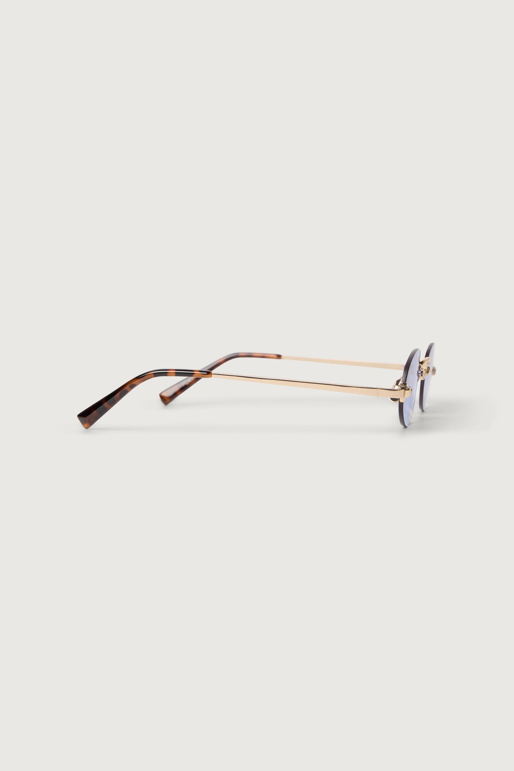 OVAL FRAMELESS SUNGLASSES
