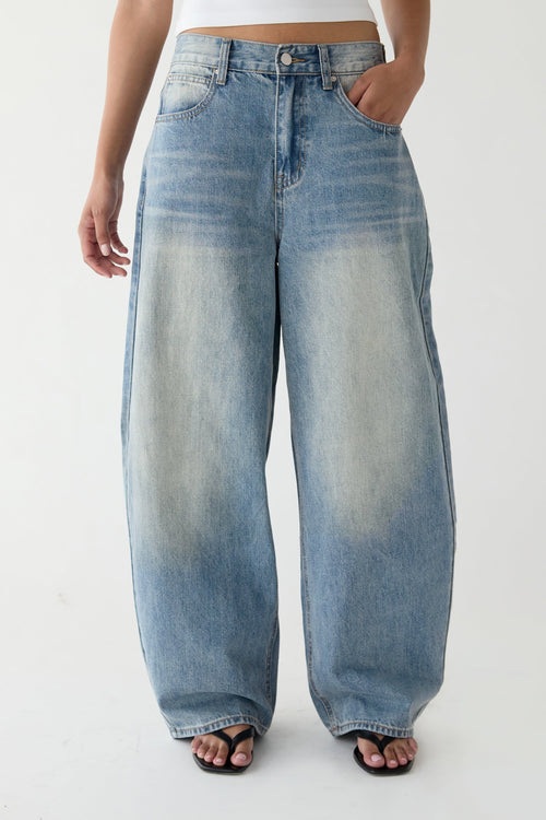 29" CURVE LEG MID RISE DENIM JEAN
