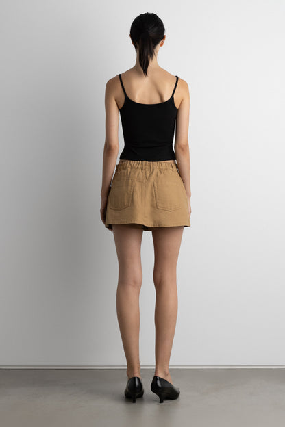 MINI CANVAS PLEATED SKORT