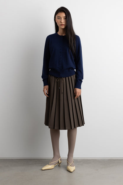 EXPOSED WAIST PLEATED MIDI SKIRT