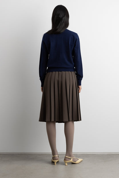 EXPOSED WAIST PLEATED MIDI SKIRT