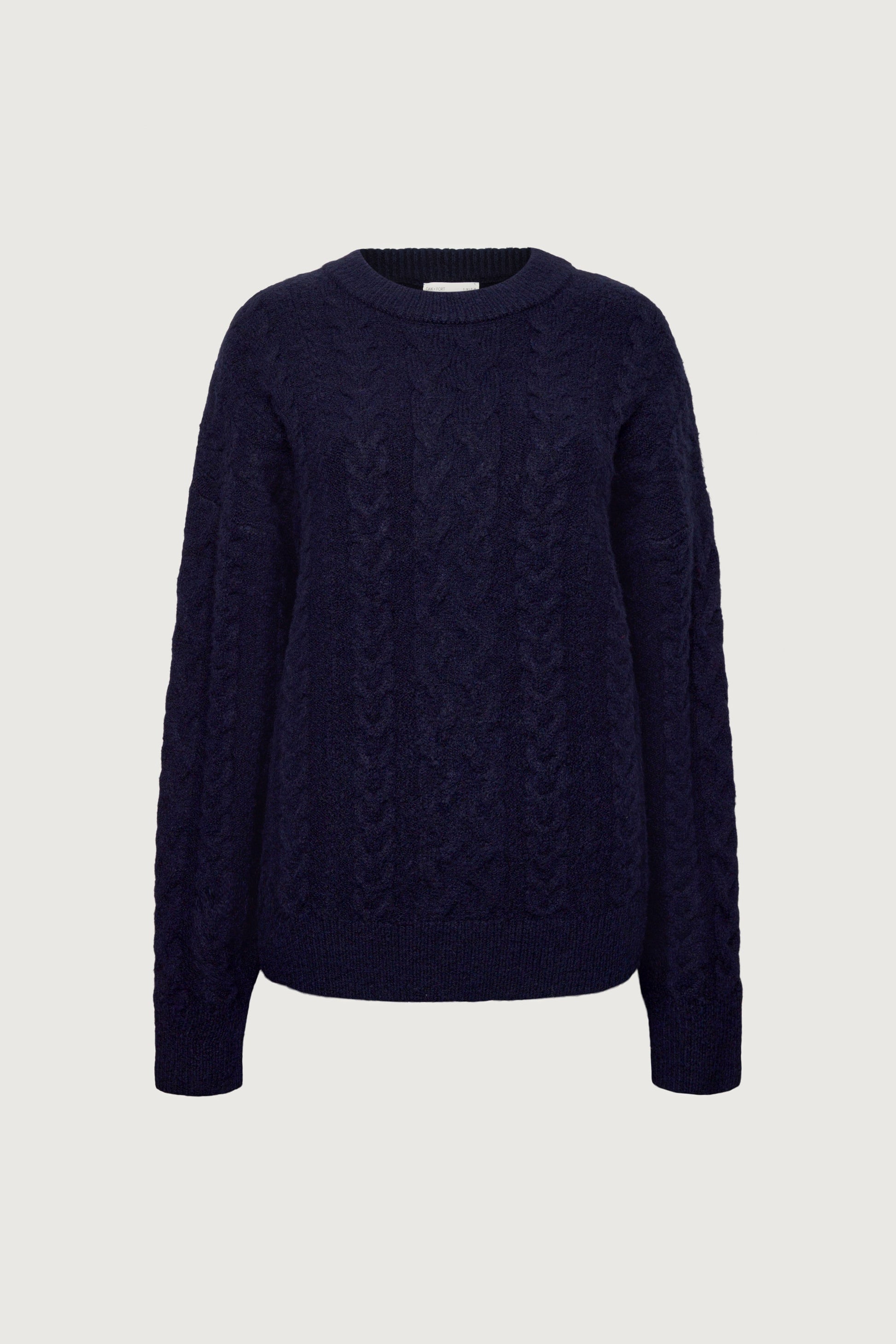 OVERSIZED CABLE KNIT SWEATER