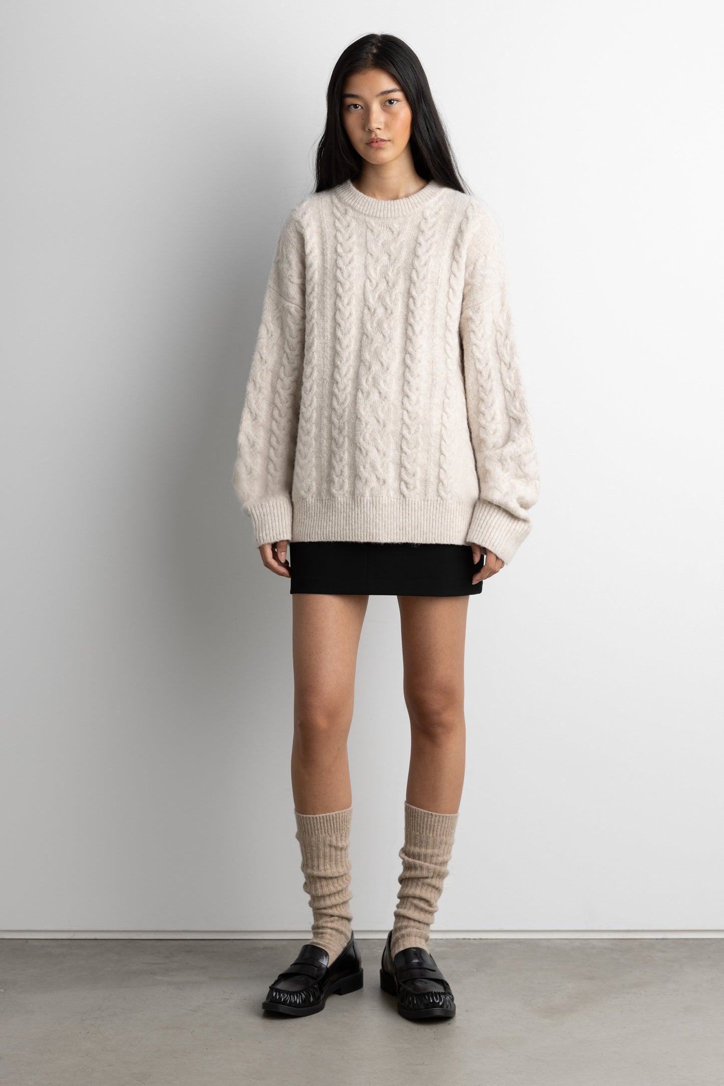 OVERSIZED CABLE KNIT SWEATER