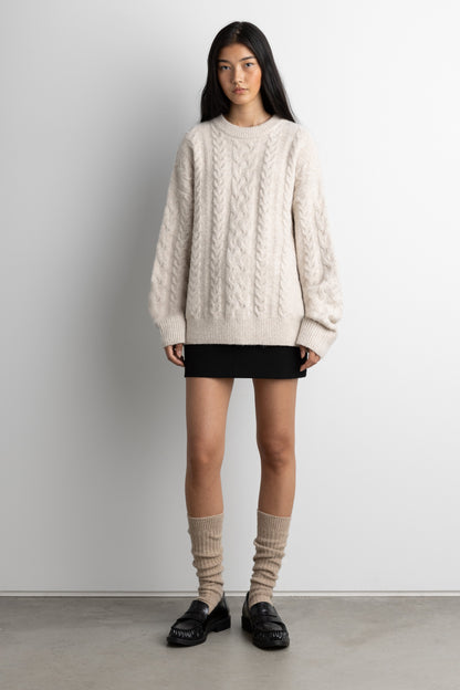 OVERSIZED CABLE KNIT SWEATER