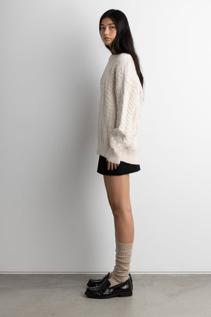 OVERSIZED CABLE KNIT SWEATER