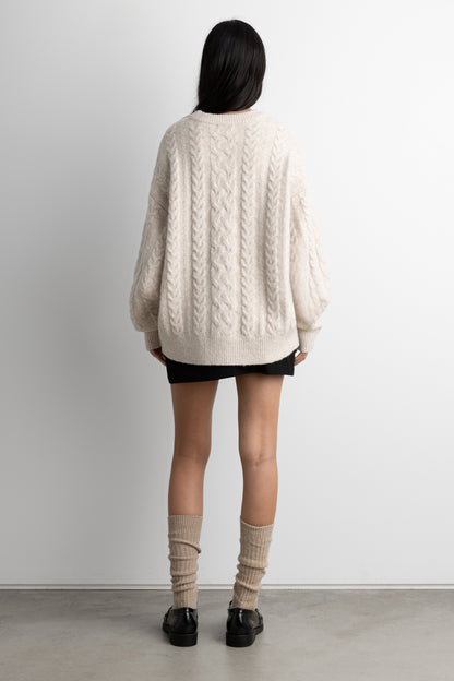 OVERSIZED CABLE KNIT SWEATER