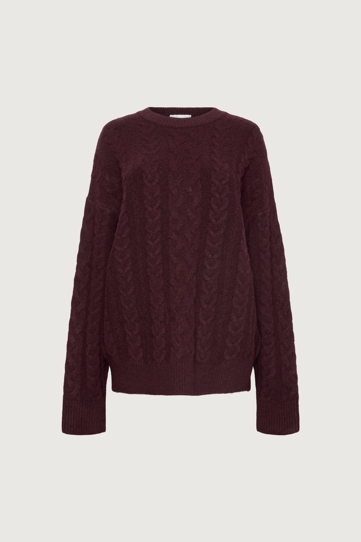 OVERSIZED CABLE KNIT SWEATER