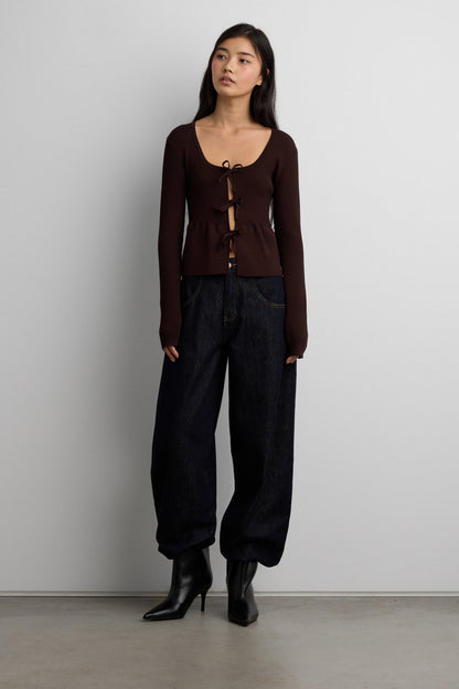 RIBBED TIE FRONT PEPLUM SWEATER