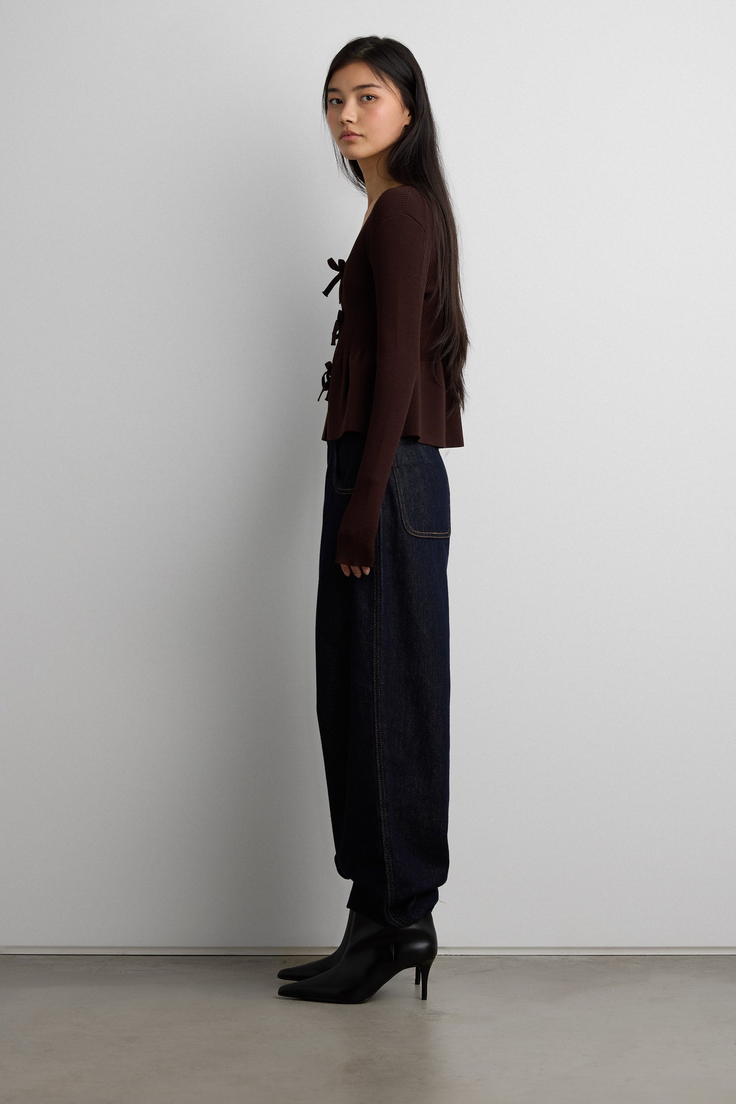 RIBBED TIE FRONT PEPLUM SWEATER