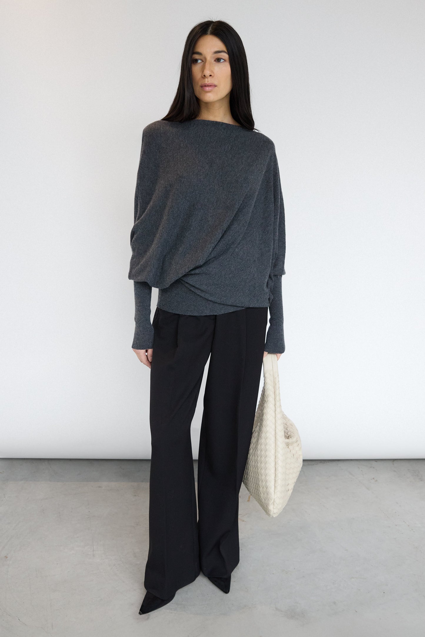 ASYMMETRICAL SWEATER WITH CUFFED SLEEVE