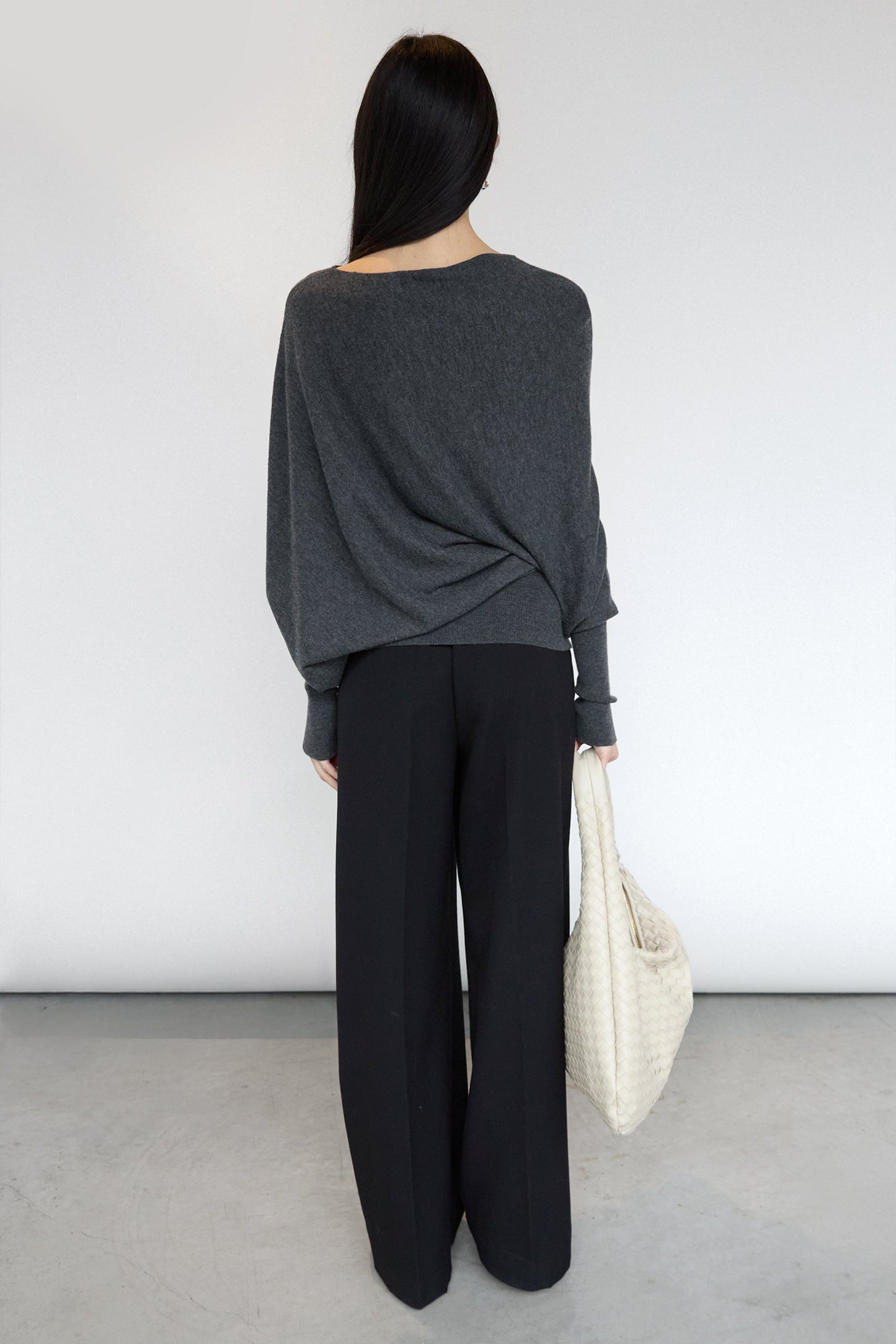 ASYMMETRICAL SWEATER WITH CUFFED SLEEVE