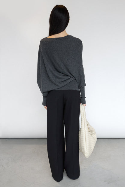 ASYMMETRICAL SWEATER WITH CUFFED SLEEVE