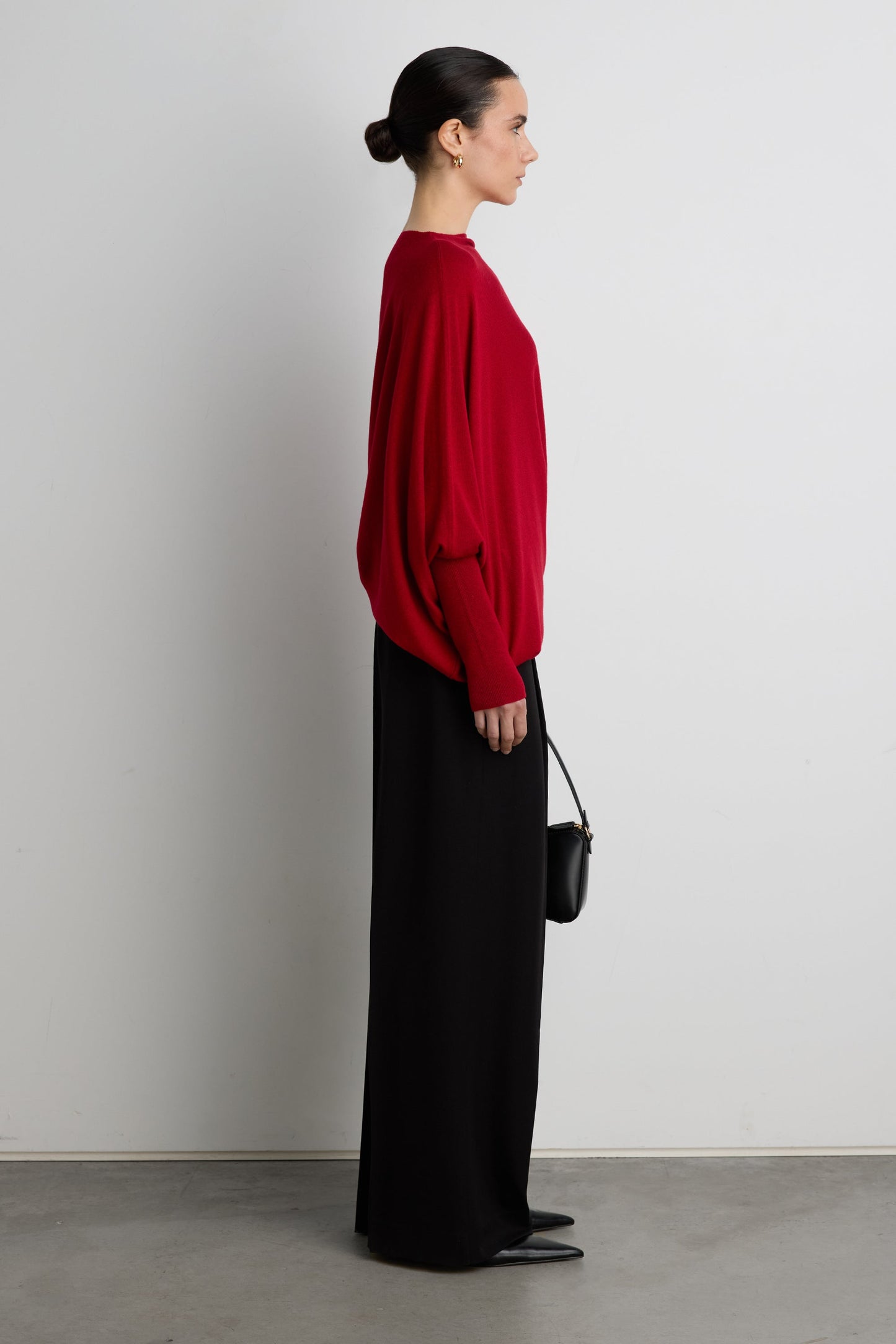 ASYMMETRICAL SWEATER WITH CUFFED SLEEVE