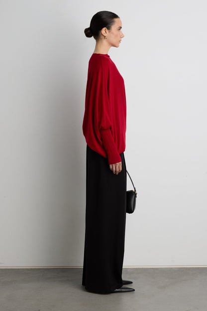 ASYMMETRICAL SWEATER WITH CUFFED SLEEVE