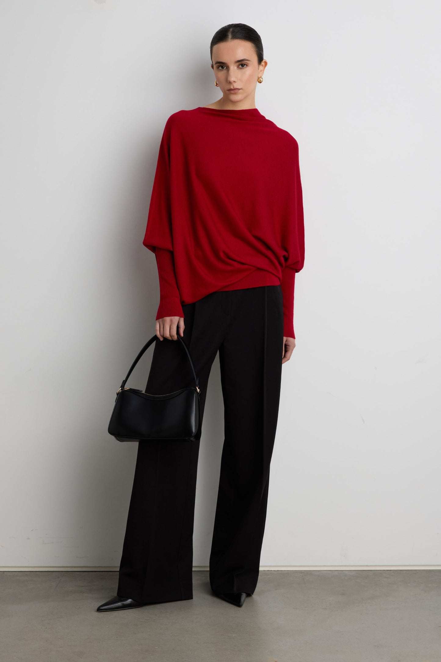 ASYMMETRICAL SWEATER WITH CUFFED SLEEVE