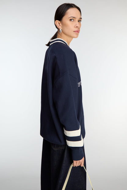 V-NECK VARSITY GRAPHIC SWEATSHIRT