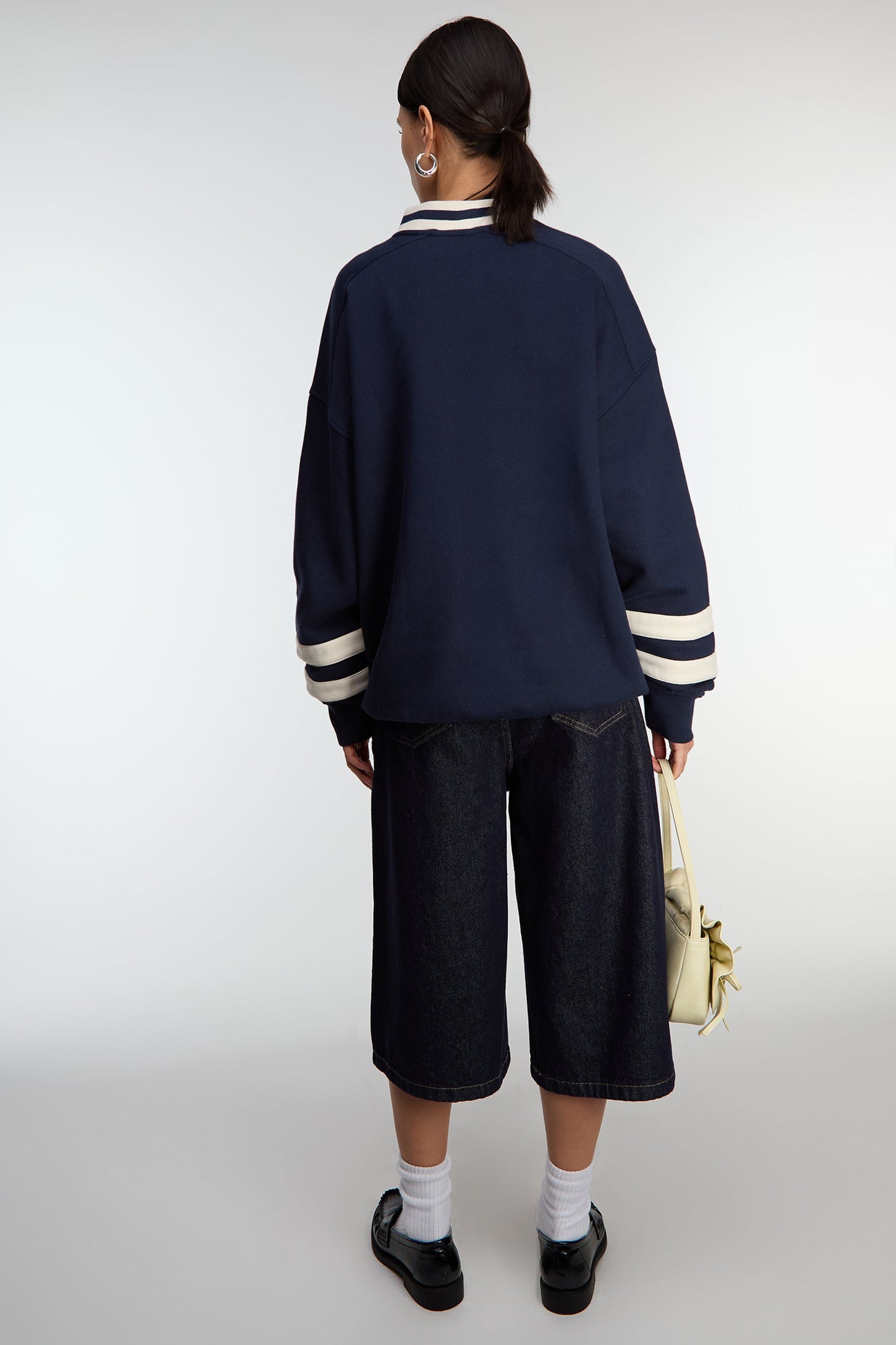 V-NECK VARSITY GRAPHIC SWEATSHIRT